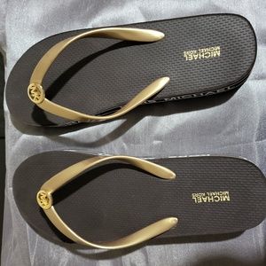 Authentic Michael Kors gold thong flip flops
